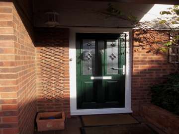Mrs H. : KELSALL . CHESHIRE : Installation of a Hamburg Composite door in Green. Double glazed with a Bespoke Bevel glass 